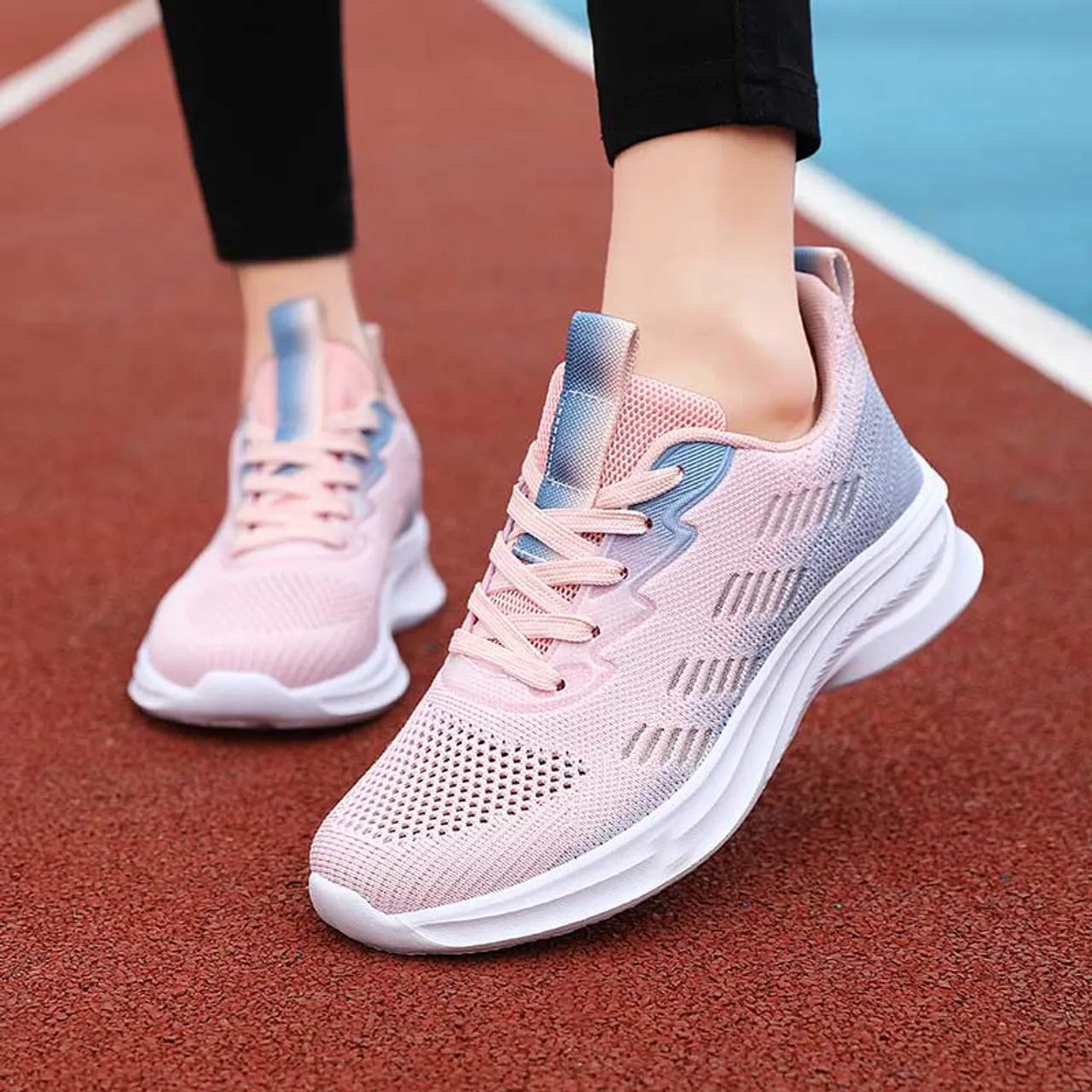 Pink flyknit stripe accents sport shoe sneaker